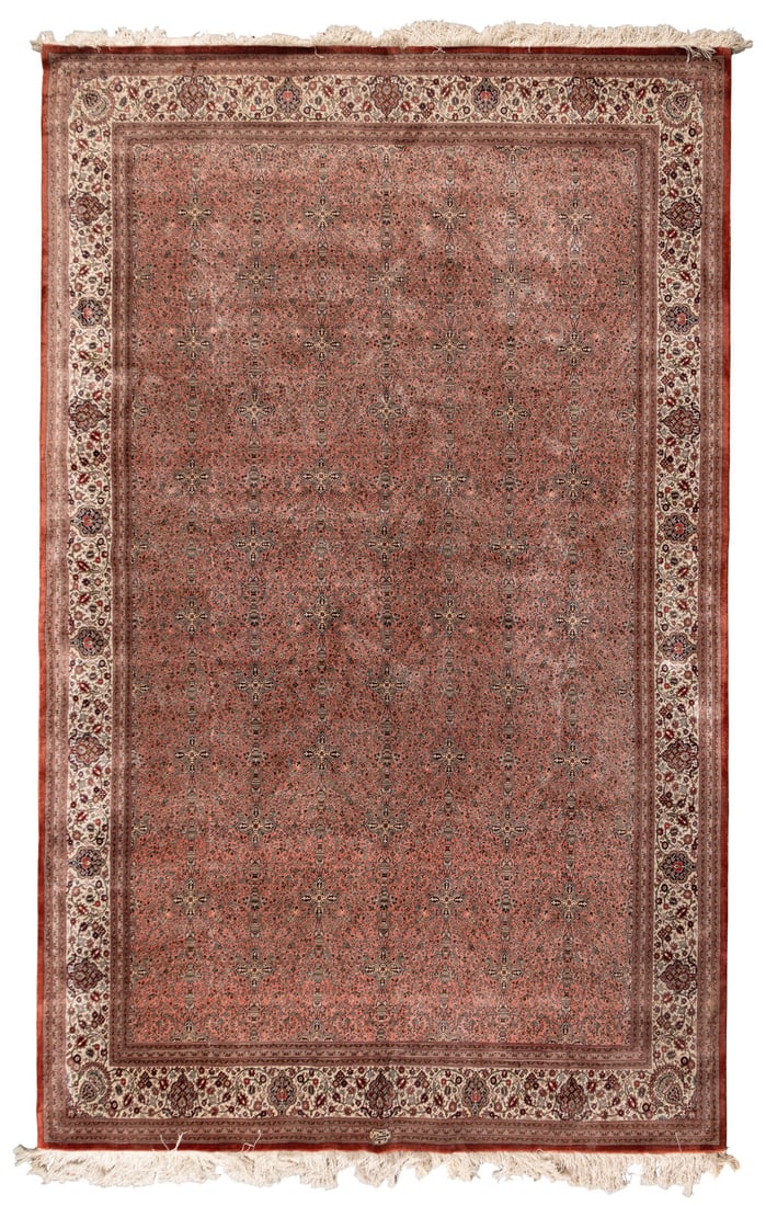 An Indian Silk Rug: An Indian Silk Rug 20th Century signed at one end. 9 feet 9 inches x 6 feet 3 inches. Property of a California Collector This lot is located in Chicago.