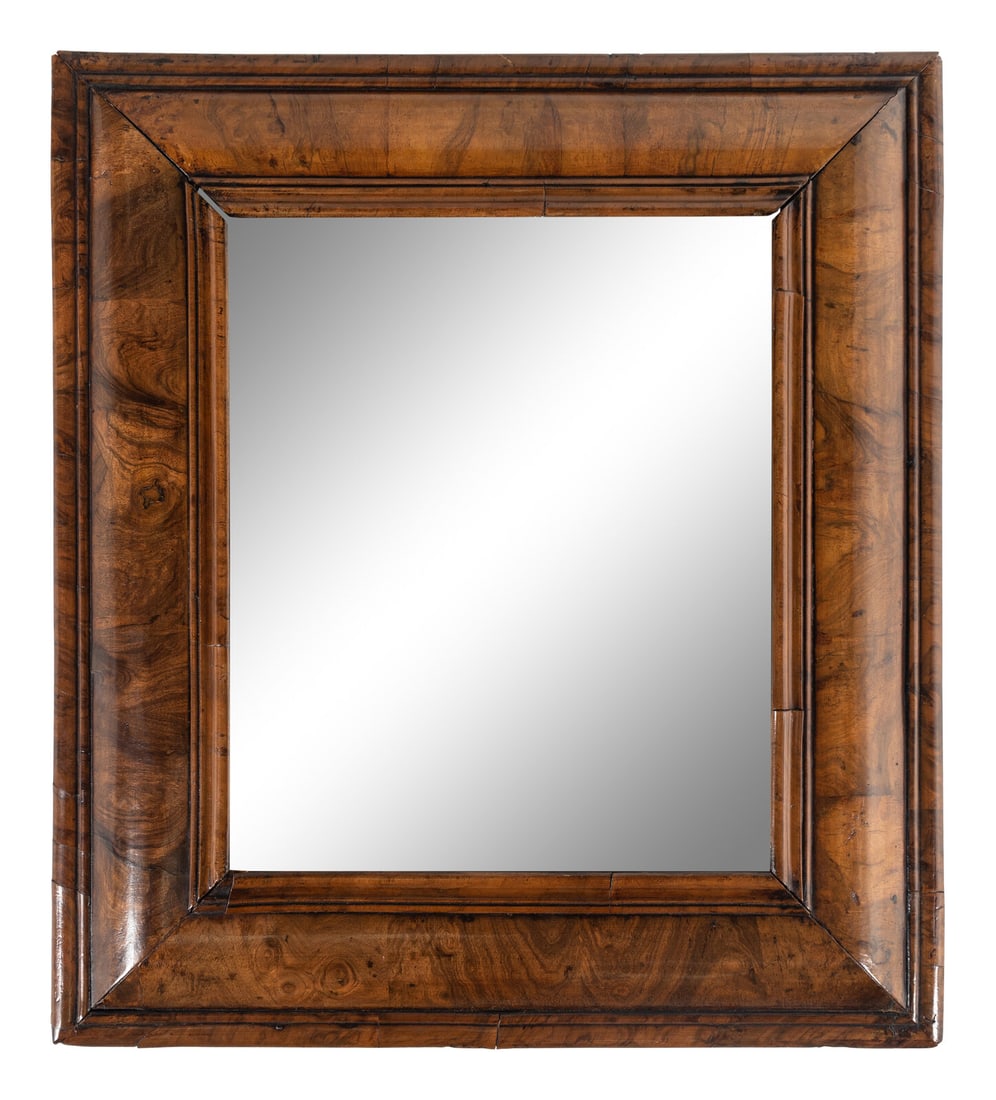 A William and Mary Walnut Mirror: A William and Mary Walnut Mirror Late 17th Century Height 25 1/2 x width 23 inches. Property from the Charlecote Antique Store, Kansas City, Missouri This lot is located in Chicago. Note: Charlecote