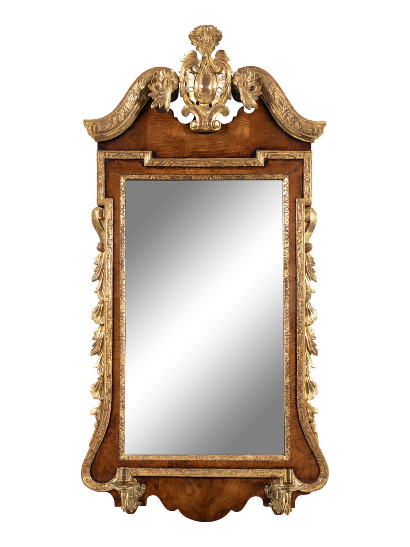 A George II Walnut and Parcel Gilt Girandole Mirror: A George II Walnut and Parcel Gilt Girandole Mirror Circa 1735 Height 47 x width 22 1/2 inches. Property from the Charlecote Antique Store, Kansas City, Missouri This lot is located in Chicago. Note: