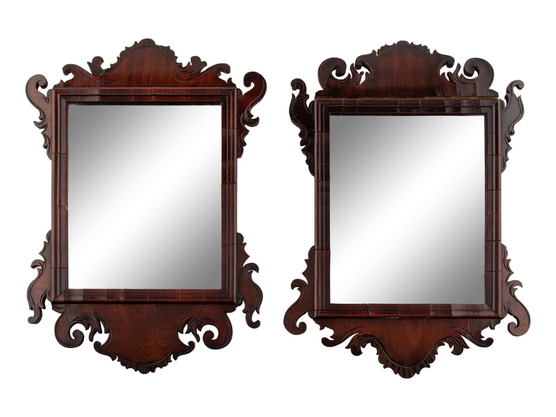 A Matched Near Pair of George III Mahogany Mirrors: A Matched Near Pair of George III Mahogany Mirrors Mid-18th Century Height 18 3/4 x width 13 inches. Property from the Charlecote Antique Store, Kansas City, Missouri This lot is located in Chicago.