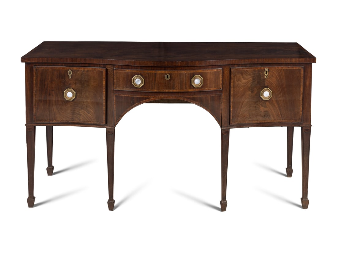 A George III Mahogany Sideboard: A George III Mahogany Sideboard Late 18th Century Height 36 x width 67 1/4 x depth 30 inches. This lot is located in Chicago.