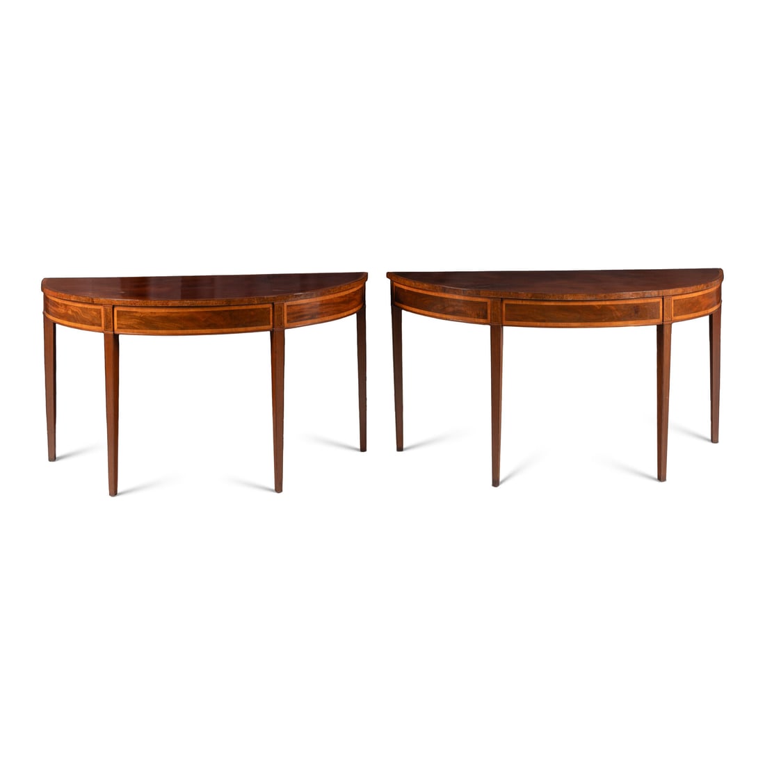 A Pair of Late George III Mahogany, Satinwood and Yew Wood Console Tables: A Pair of Late George III Mahogany, Satinwood and Yew Wood Console Tables First Quarter 19th Century Height 36 1/4 x width 67 3/4 x depth 26 1/4 inches. Property from the Wetherill Family Collection, 