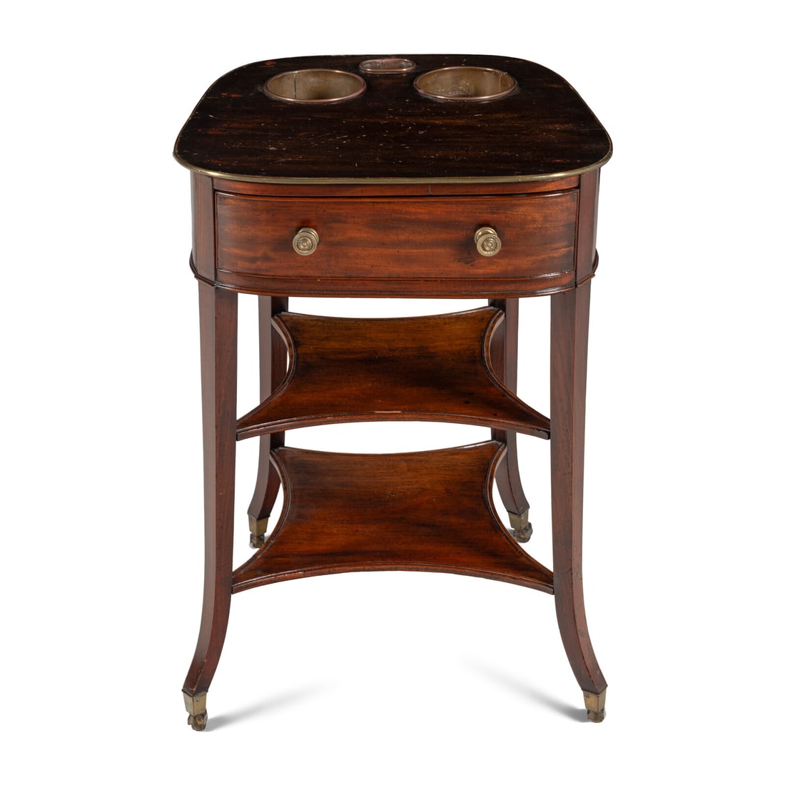 An Edwardian Brass Banded Mahogany Wine Table: An Edwardian Brass Banded Mahogany Wine Table Early 20th Century Height 30 x width 20 1/2 x depth 19 1/2 inches. Property from the Wetherill Family Collection, Main Line, Philadelphia and