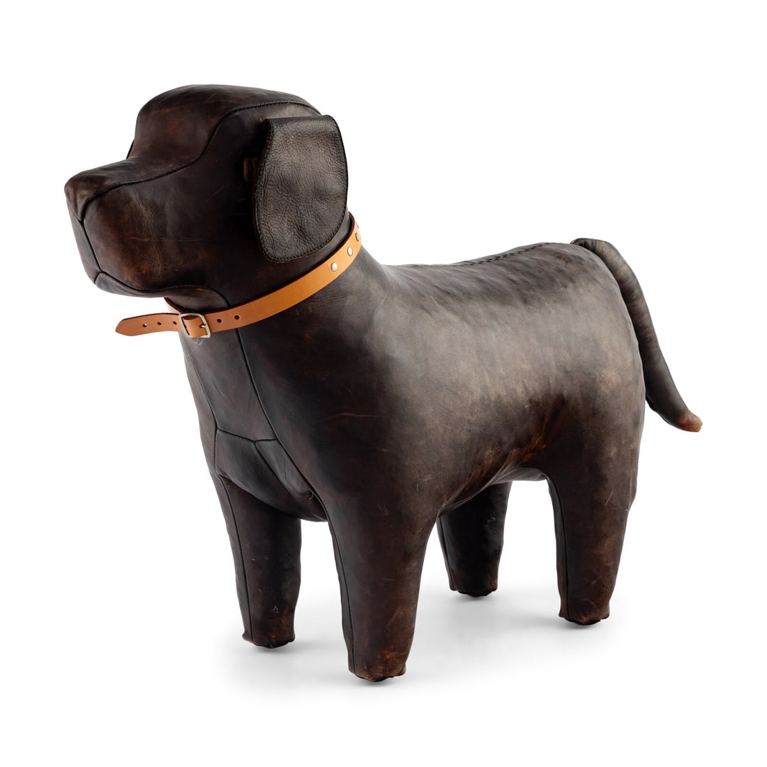 An Omersa and Co. Leather Dog Footstool: An Omersa and Co. Leather Dog Footstool 20th Century Height 21 x width 10 x depth 33 inches. This lot is located in Chicago.