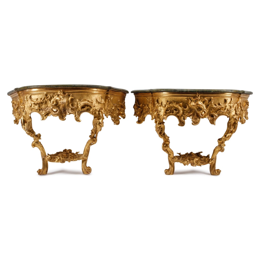 A Pair of German Rococo Style Giltwood Console Tables: A Pair of German Rococo Style Giltwood Console Tables 19th Century and Later with faux painted marble tops. Height 31 x width 46 x depth 22 inches. This lot is located in Chicago.