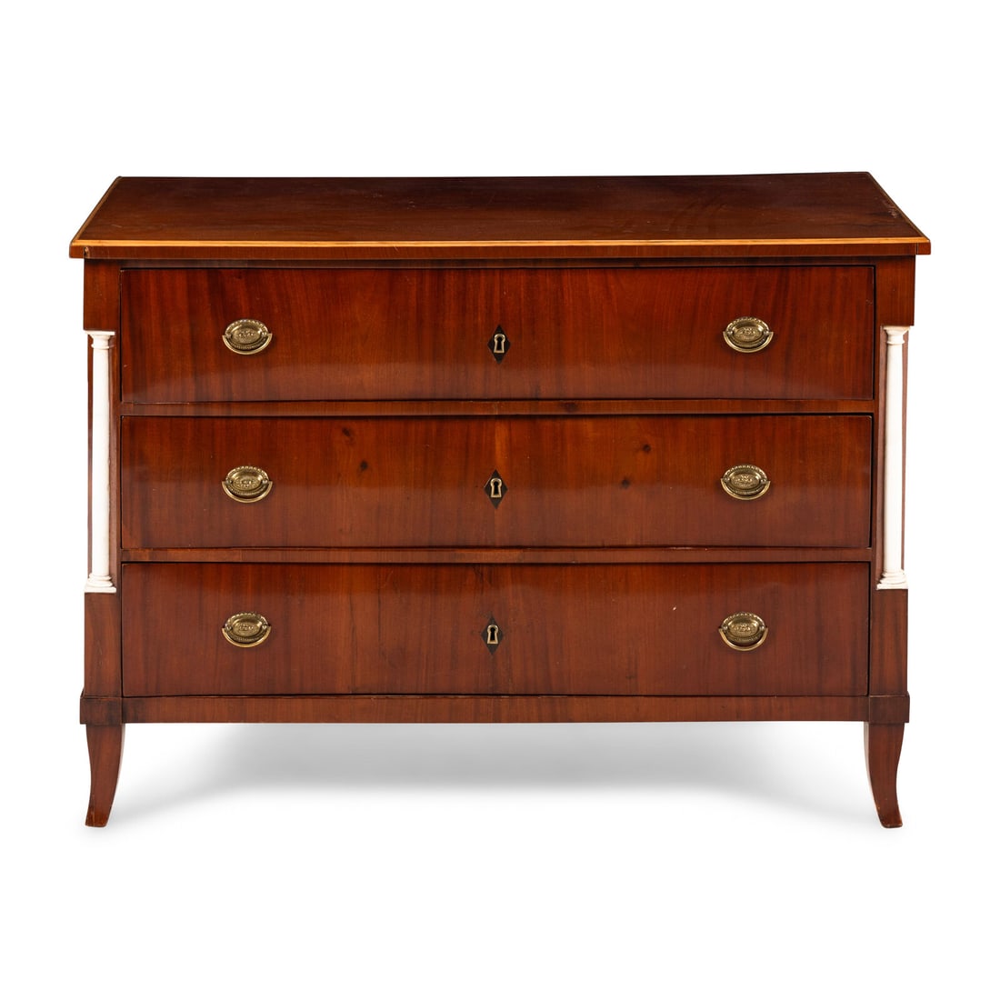 A German Neoclassical Figured Walnut and White Marble Mounted Commode: A German Neoclassical Figured Walnut and White Marble Mounted Commode Circa 1820-30 Height 32 1/2 x width 46 x depth 22 1/2 inches. Property from the Estate of Beverly Flynn, Chicago, Illinois This