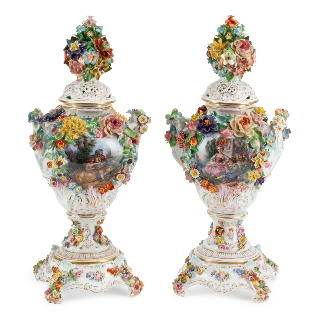 A Pair of Dresden Porcelain Urns and Covers: A Pair of Dresden Porcelain Urns and Covers 19th Century marked 'Dresden' to undersides. Height 21 x width 9 1/2 x depth 7 1/2 inches. This lot is located in Chicago.