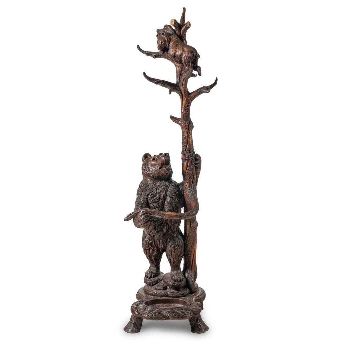 A "Black Forest" Carved Bear-Form Hall Tree: A "Black Forest" Carved Bear-Form Hall Tree Late 19th/Early 20th Century Height 89 x width 20 x depth 24 1/2 inches. This lot is located in Chicago.