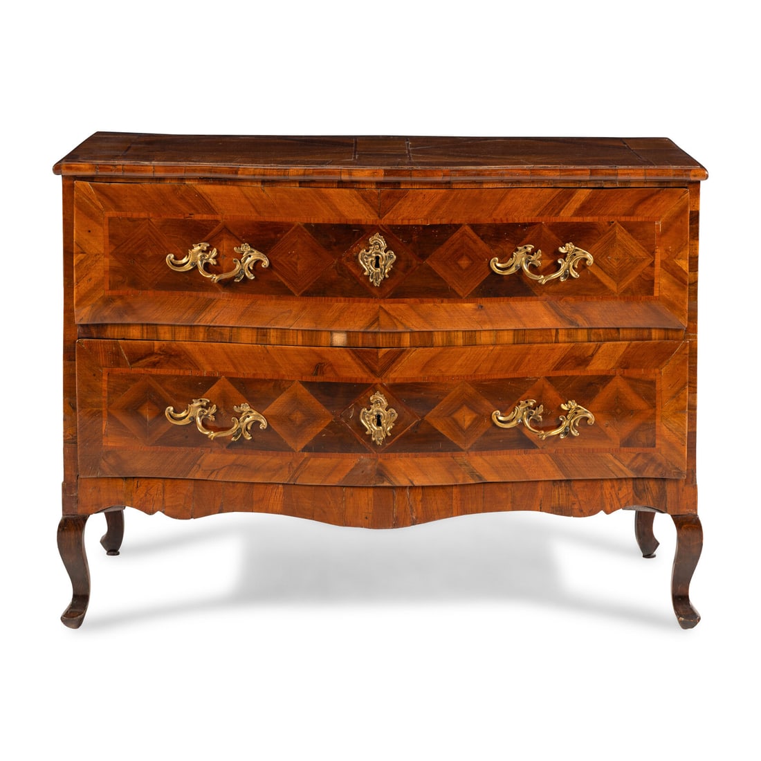 A Continental Parquetry Chest of Drawers: A Continental Parquetry Chest of Drawers First Half 19th Century Height 32 1/2 x width 43 x depth 21 inches. This lot is located in Chicago.