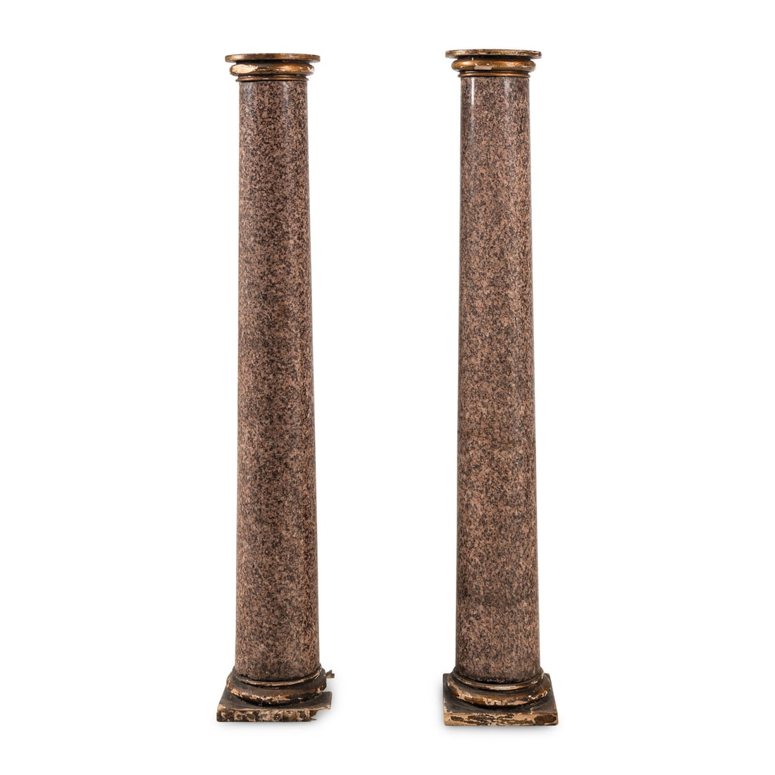 A Pair of Continental Pink Granite Pedestals: A Pair of Continental Pink Granite Pedestals 19th Century each having giltwood bases and capitals. Height 54 1/4 x diameter of top 9 inches, Property from the Wetherill Family Collection, Main Line,