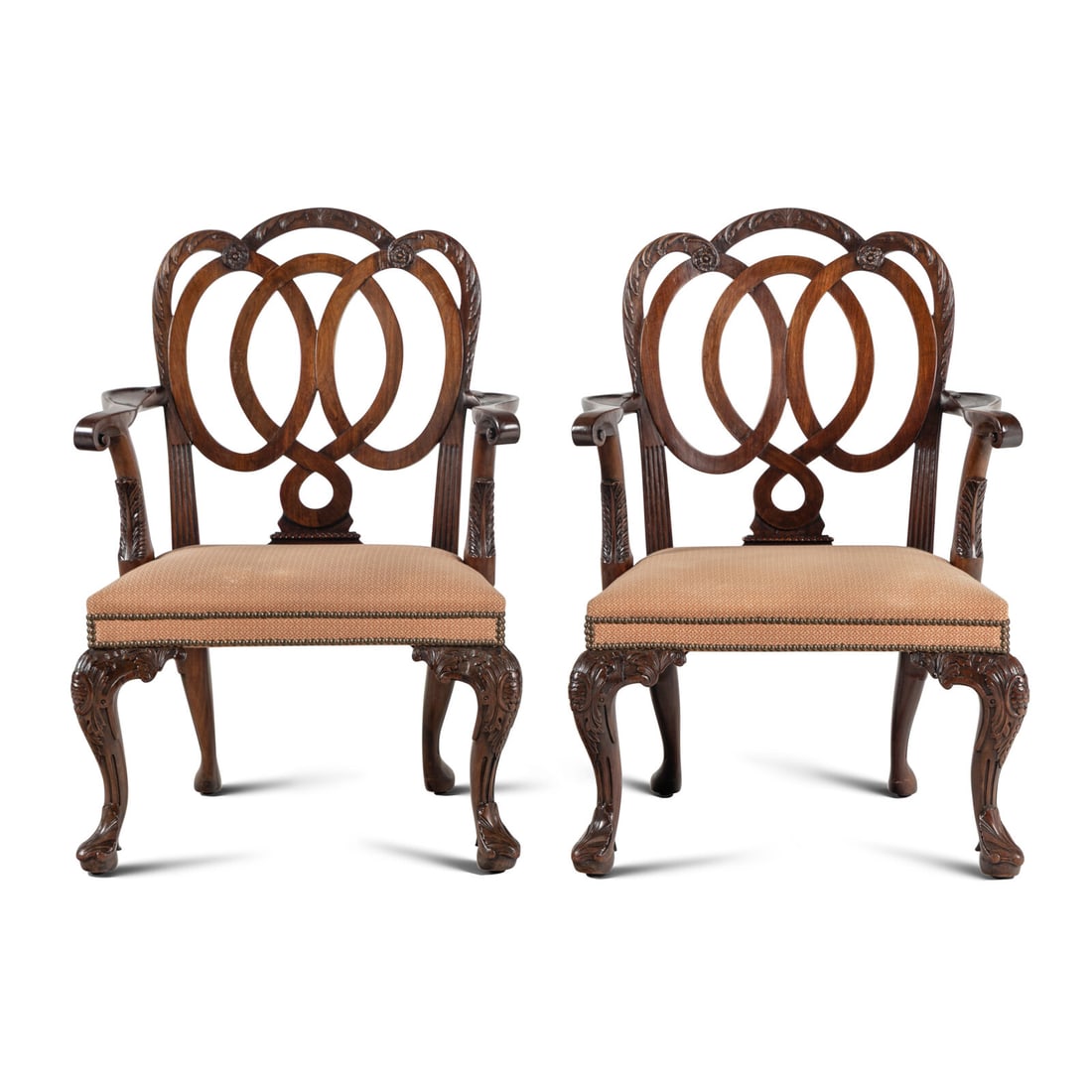 A Pair of Continental Mahogany Armchairs: A Pair of Continental Mahogany Armchairs 19th Century Height 38 x width 26 x depth 26 inches. Property from the Estate of Beverly Flynn, Chicago, Illinois This lot is located in Chicago.