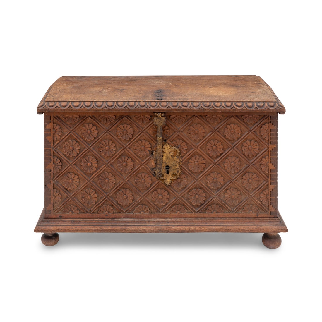 A Spanish Carved Walnut and Gilt Iron Chest: A Spanish Carved Walnut and Gilt Iron Chest 19th Century and Incorporating Earlier Elements Height 29 x width 46 x depth 24 inches. Property from a South Florida Institution This lot is located in