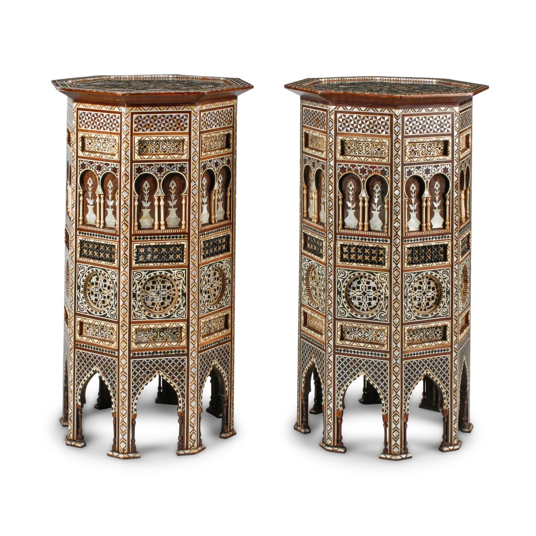 A Pair of Large Moorish Style Marquetry and Mother-of-Pearl Inlaid Side Tables: A Pair of Large Moorish Style Marquetry and Mother-of-Pearl Inlaid Side Tables 20th Century Height 38 1/2 x diameter 24 inches. This lot is located in Chicago.