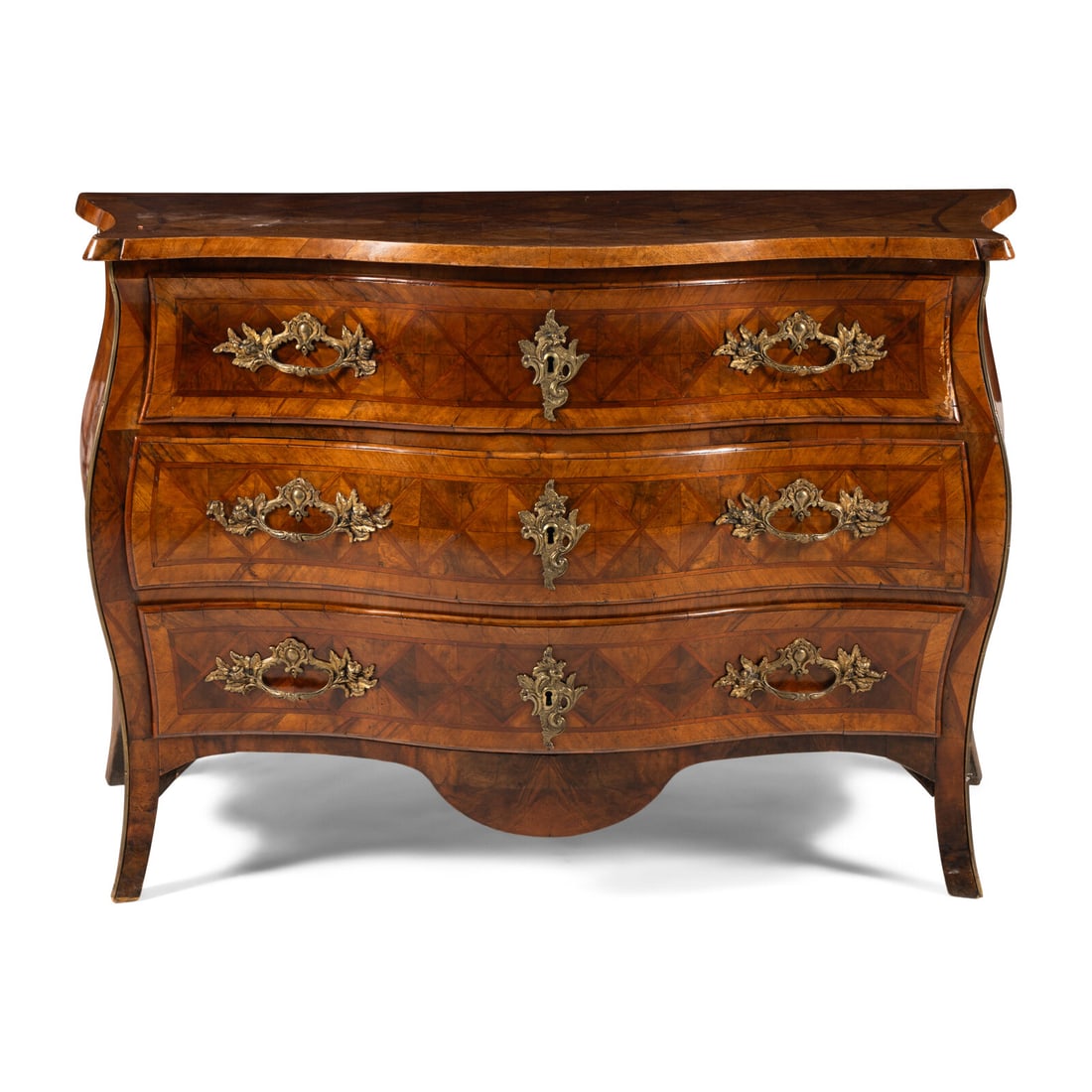 An Italian Gilt Bronze Mounted Walnut and Parquetry Commode: An Italian Gilt Bronze Mounted Walnut and Parquetry Commode 18th Century Height 33 1/4 x width 51 1/2 x depth 24 3/4 inches. Property of a California Collector This lot is located in Chicago.