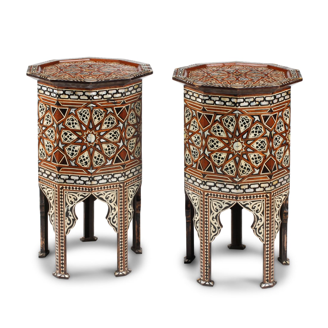 A Pair of Moorish Style Marquetry and Mother-of-Pearl Inlaid Side Tables: A Pair of Moorish Style Marquetry and Mother-of-Pearl Inlaid Side Tables 20th Century Height 27 3/4 x diameter 18 1/4 inches. This lot is located in Chicago.