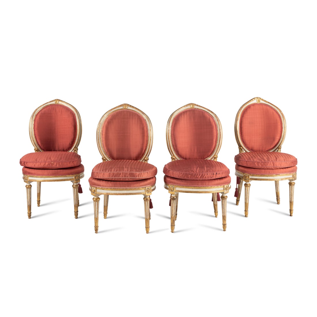 A Set of Four Italian Neoclassical CrËme-Painted and Parcel Gilt Side Chairs: A Set of Four Italian Neoclassical CrËme-Painted and Parcel Gilt Side Chairs Late 18th Century Height 36 x width 20 x depth 19 1/2 inches. Property from the Estate of Beverly Flynn, Chicago, Illi