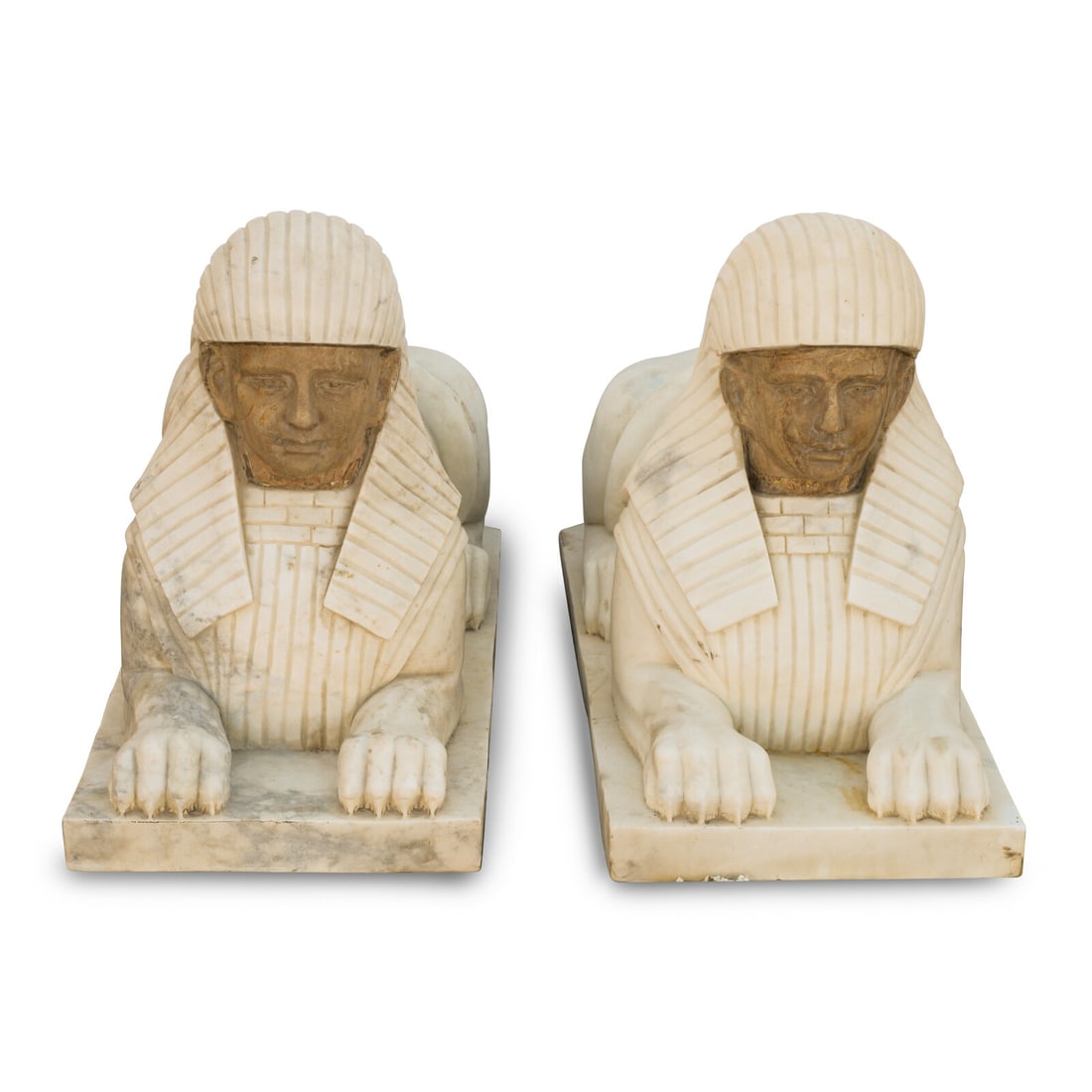 A Pair of Italian Marble Sphinxes: A Pair of Italian Marble Sphinxes 20th Century Height 24 x width 16 x depth 39 inches. This lot is located in Chicago.