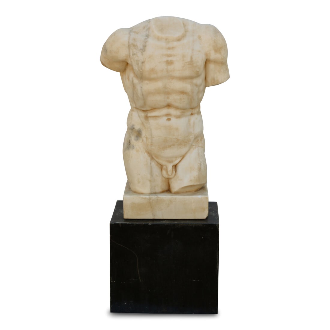 An Italian Marble Torso of a Man: An Italian Marble Torso of a Man After the Antique, 20th Century together with an associated black marble plinth. Height of sculpture 33 x width 22 x depth 12 inches. This lot is located in Chicago.