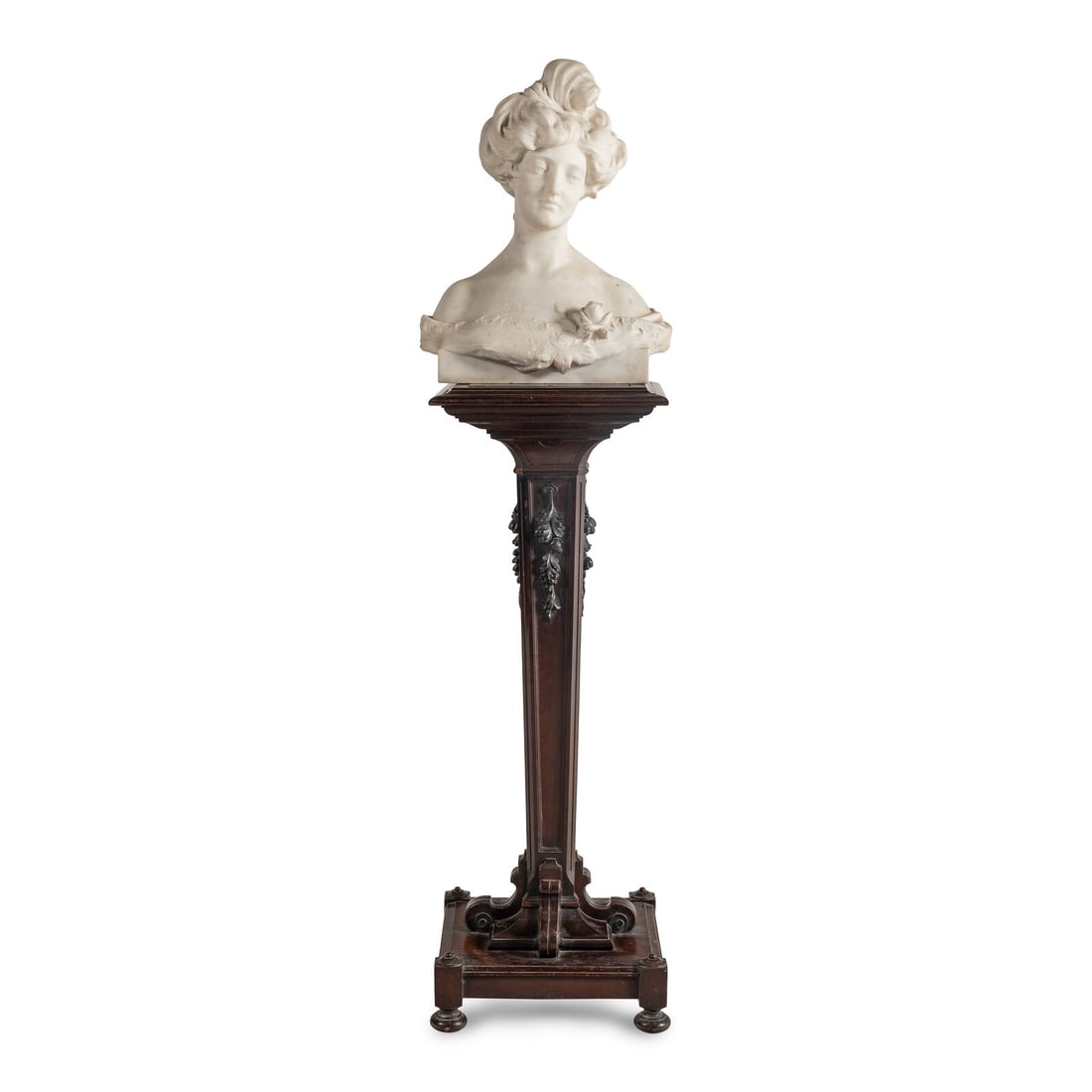 An Italian Carved Marble Bust of a Young Woman: An Italian Carved Marble Bust of a Young Woman Late 19th/Early 20th Century signed Prof A Larmerini, together with an associated carved wood pedestal. Height of bust 21 x width 17 x depth 8 inches. Pr