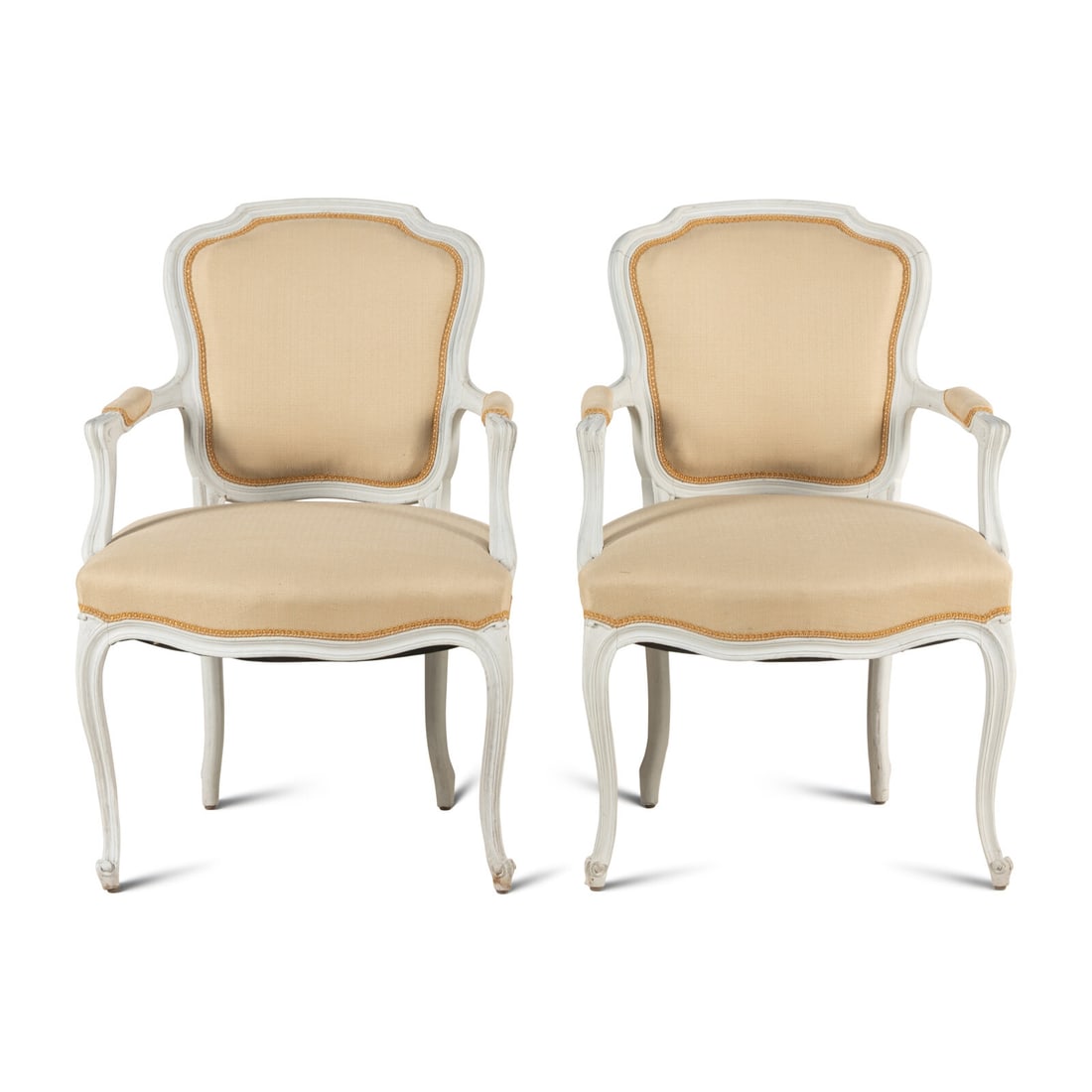 A Pair of Louis XV Style White-Painted Fauteuils: A Pair of Louis XV Style White-Painted Fauteuils 20th Century Height 37 1/2 x width 25 x depth 21 inches. Property from the Collection of Patricia and Michael Corbett, Kenilworth, Illinois This lot is