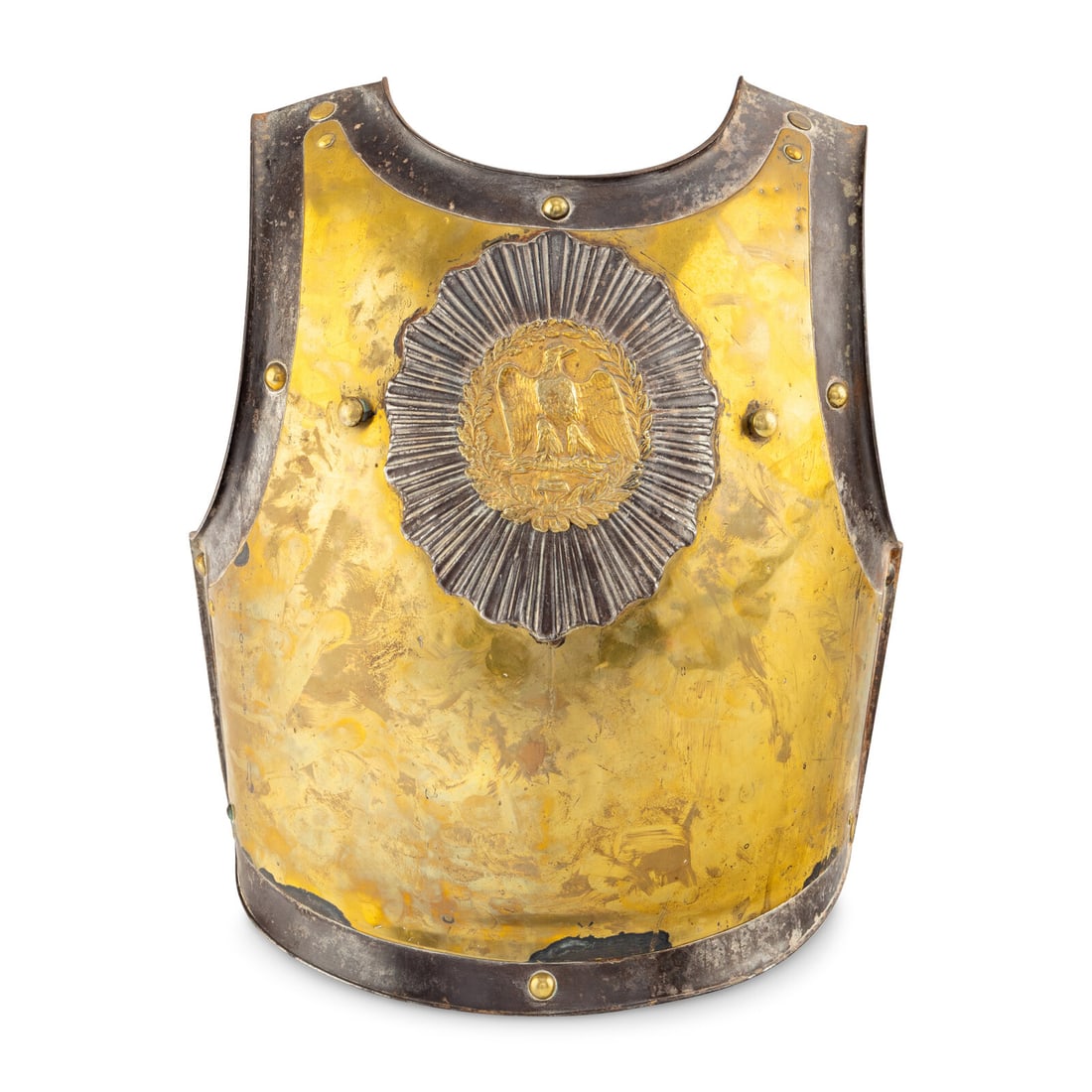 A French Brass and Iron Cuirass: A French Brass and Iron Cuirass 19th Century unmarked, bearing an eagle crest on the center of the plate. Height 16 x width 14 x depth 7 inches. Property from the Estate of Audrey and Philip Rietveld,