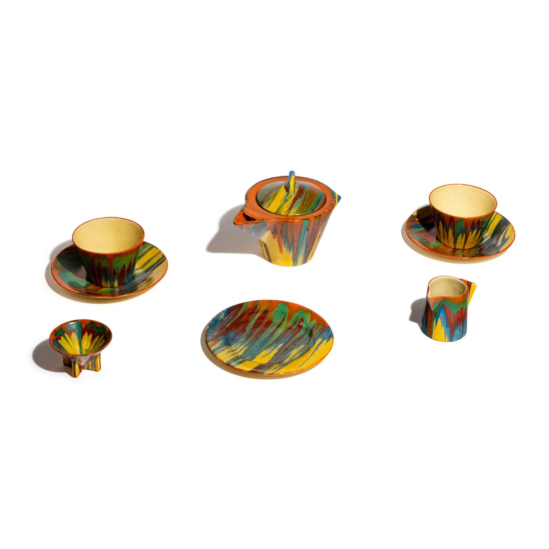 Clarice Cliff (English, 1899-1972) Delecia Group of 6 items, c. 1930: Clarice Cliff (English, 1899-1972) Delecia Group of 6 items, c. 1930 glazed ceramic each with stamped signature to underside 'Clarice Cliff' teapot: 4 1/2 h x 8 w x 4 3/4 d inches. Property from the C