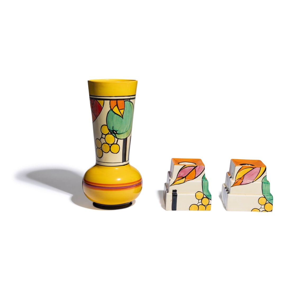 Clarice Cliff (English, 1899-1972) Apples pattern Vase and two Candlesticks, c. 1931-32 (1 of 4)