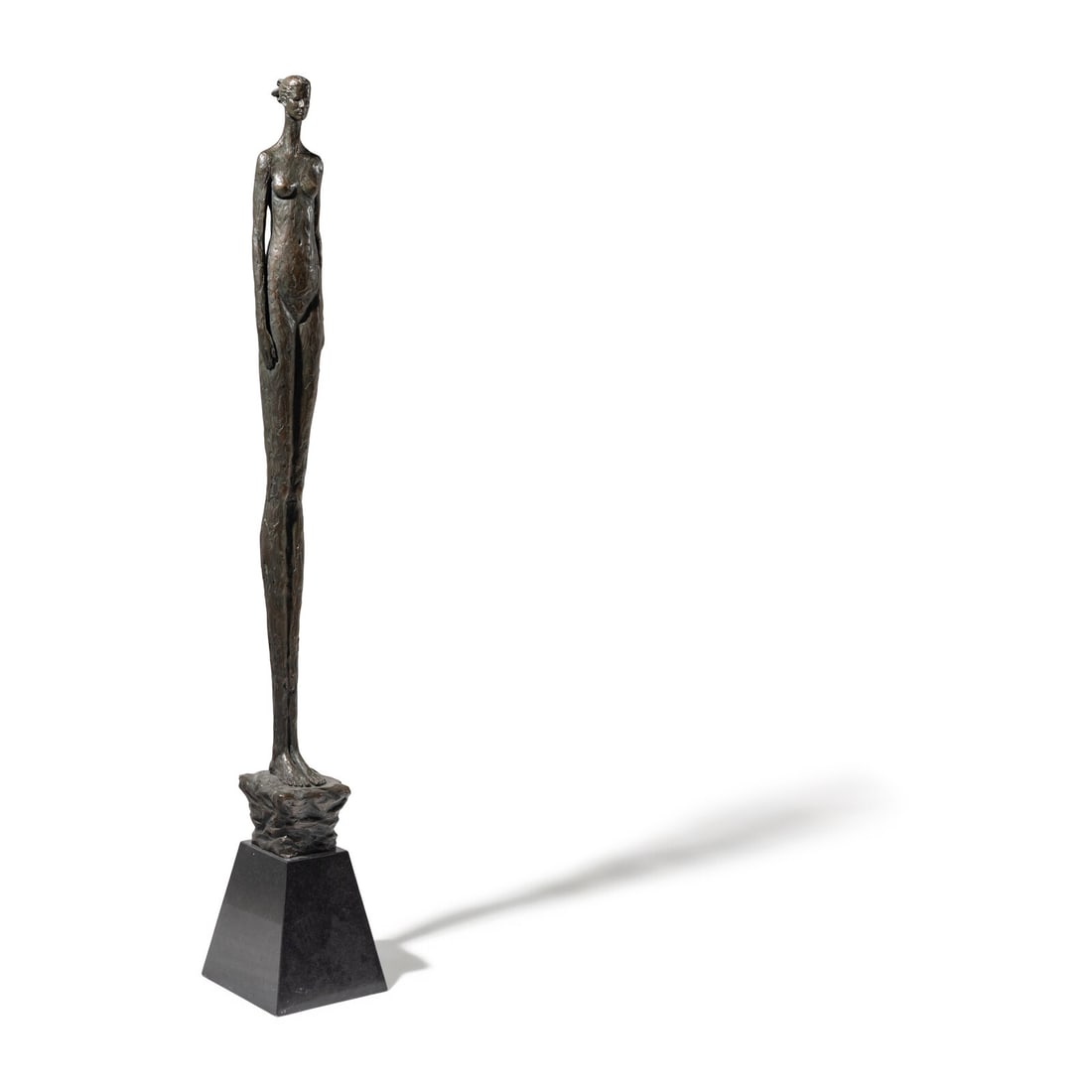 Tom Corbin (American, b. 1954) Untitled (Standing Woman): Tom Corbin (American, b. 1954) Untitled (Standing Woman) bronze with dark patina incised Tom Corbin and numbered 11/60 (base) Height: 51 1/2 inches. This lot is located in Chicago.
