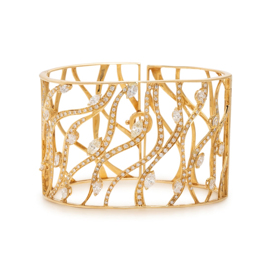 Yellow Gold and Diamond Cuff Bracelet: Yellow Gold and Diamond Cuff Bracelet Round brilliant and marquise cut diamonds weighing approximately 3.50 carats total, hinged with clasp closure. Yellow gold. 7 inches inner circumference, 1 3/4 in
