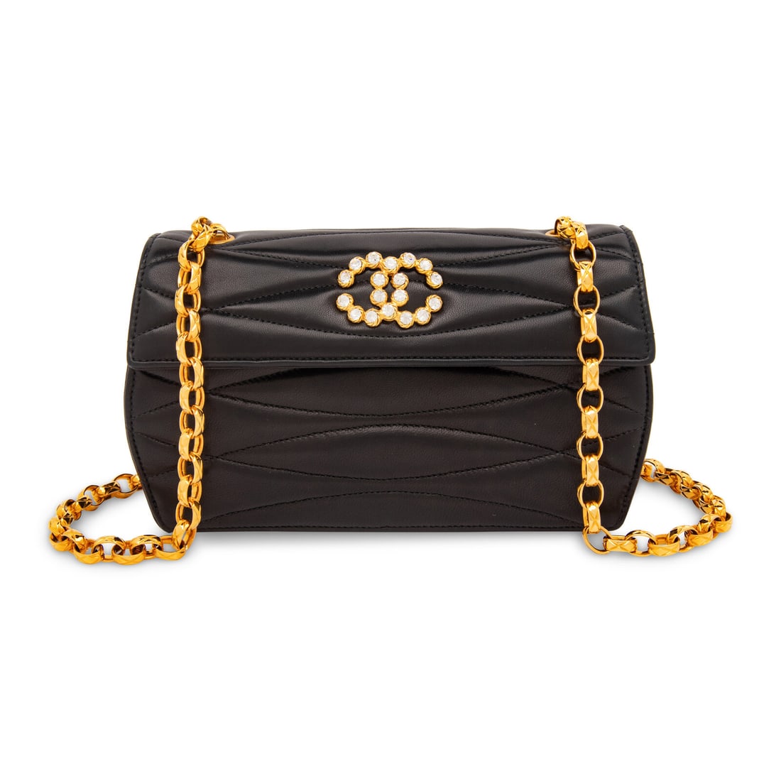 Chanel, Rhinestone CC Leather Flap Bag: Chanel, Rhinestone CC Leather Flap Bag Flap bag in quilted black lambskin leather with gold-tone hardware and a rhinestone-set CC embellishment. Magnetic snap closure to flap and quilted-effect chain-