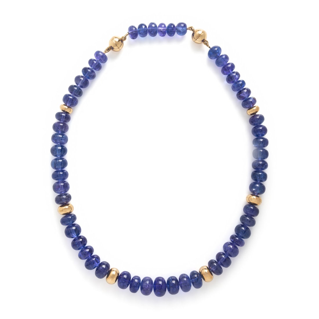 Tanzanite and Yellow Gold Beaded Necklace: Tanzanite and Yellow Gold Beaded Necklace Tanzanite rondelles measuring approximately 8.75 - 12.25 mm, with detachable magnetic extender. 18 karat yellow gold. 18 1/2 inches long with extender, or 16 