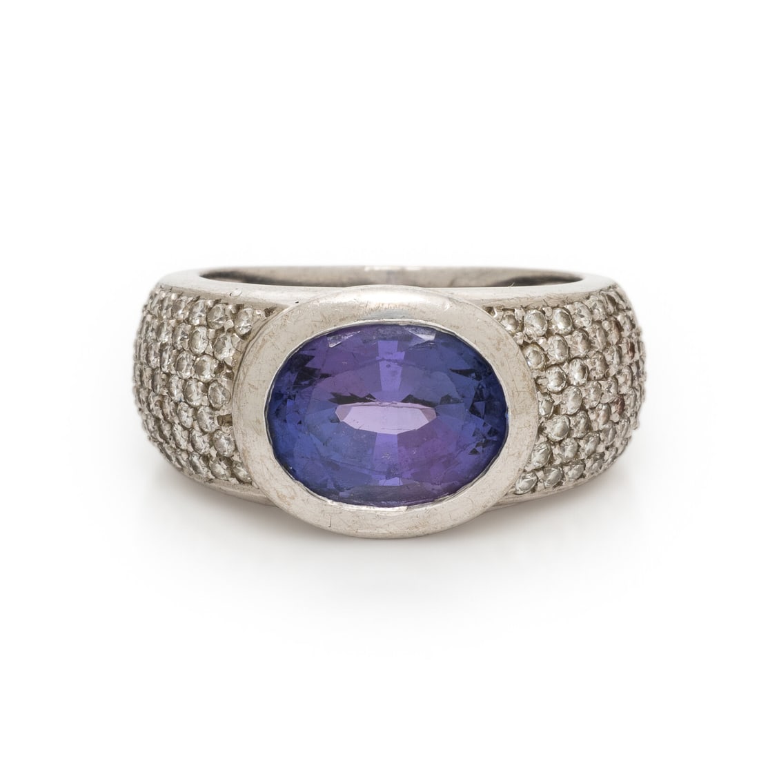H. Stern, Tanzanite, Diamond, and White Gold Ring: H. Stern, Tanzanite, Diamond, and White Gold Ring Oval tanzanite weighing approximately 3.25 carats by formula, and pavÈ-set round brilliant cut diamonds weighing approximately 0.75 carat total. 