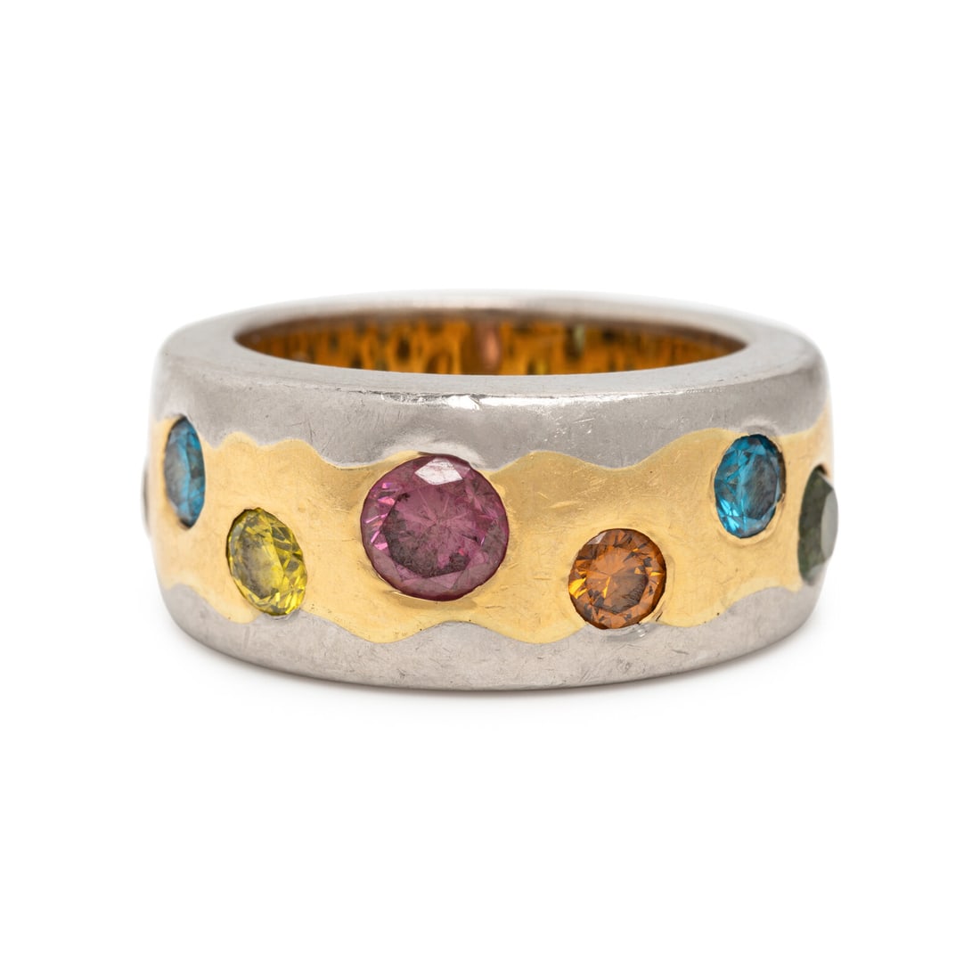 Multigem, Platinum, and Yellow Gold Ring: Multigem, Platinum, and Yellow Gold Ring Variously colored round treated topaz. Yellow gold and platinum. Ring size 6 1/2. Gross weight: 12.15 dwt. Property from a Naples, Florida Estate This lot is l