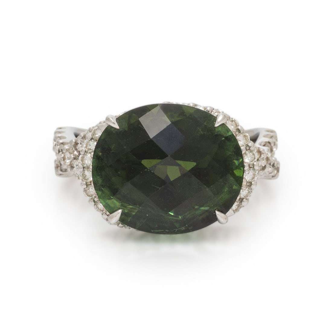 Green Tourmaline, Diamond, and White Gold Ring: Green Tourmaline, Diamond, and White Gold Ring Oval checkerboard-faceted green tourmaline measuring approximately 13.85 x 12.00 x 8.75 mm, and round brilliant cut diamonds weighing approximately 0.60 