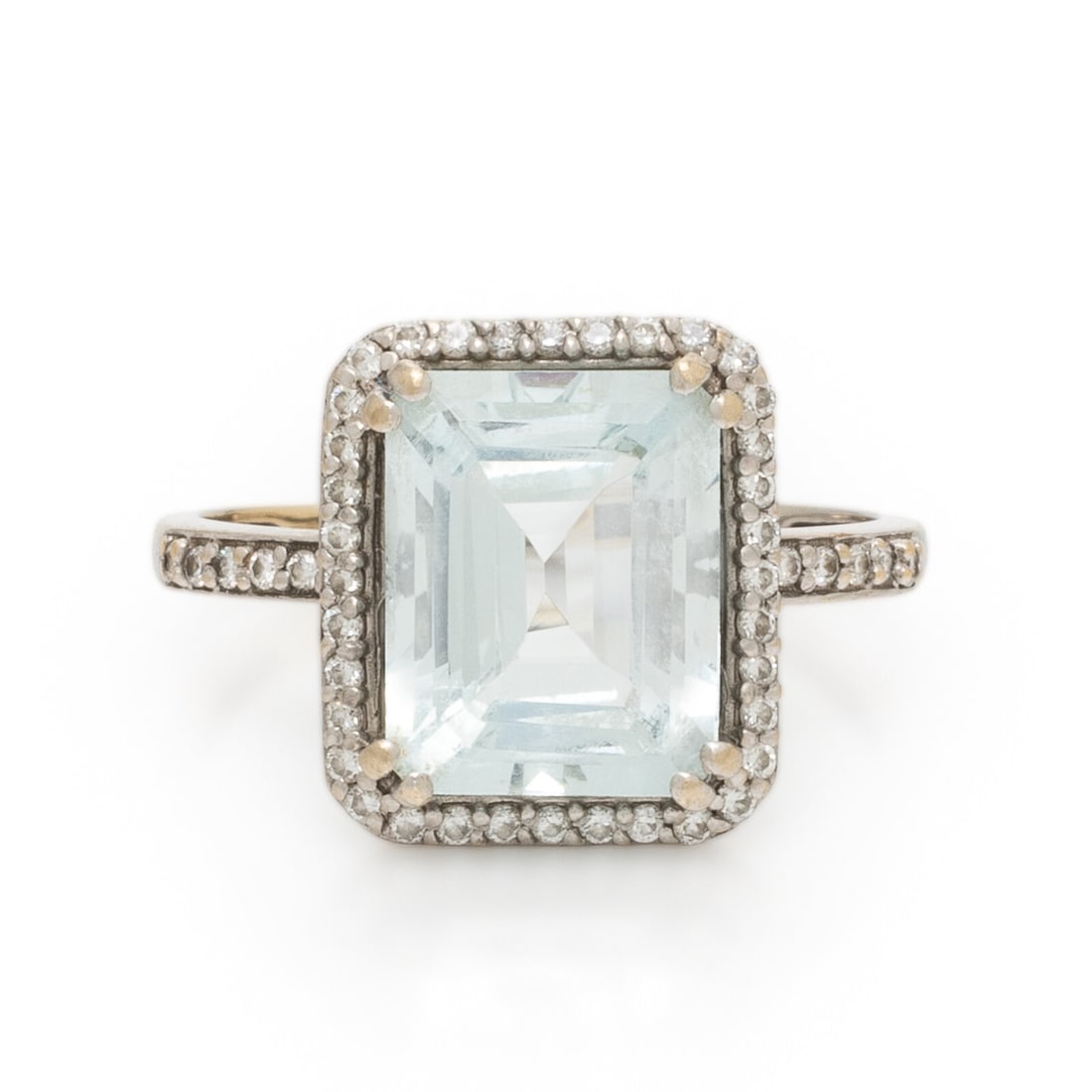 Birks, Aquamarine and Diamond Ring: Birks, Aquamarine and Diamond Ring Emerald cut aquamarine weighing approximately 2.25 carats by formula and round brilliant cut diamonds. White gold. Ring size 4 1/2. Stamp: (obscured). Gross weight: 