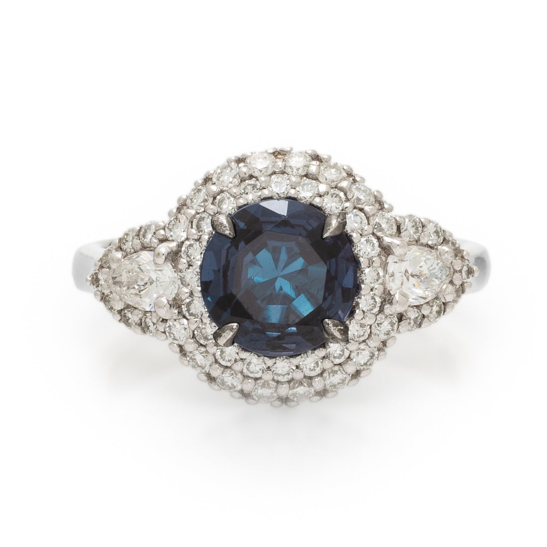 Hubert, Synthetic Alexandrite and Diamond Ring: Hubert, Synthetic Alexandrite and Diamond Ring Round synthetic alexandrite measuring approximately 7.35 x 7.35 mm, and round brilliant cut and pear shape diamonds weighing approximately 0.70 carat