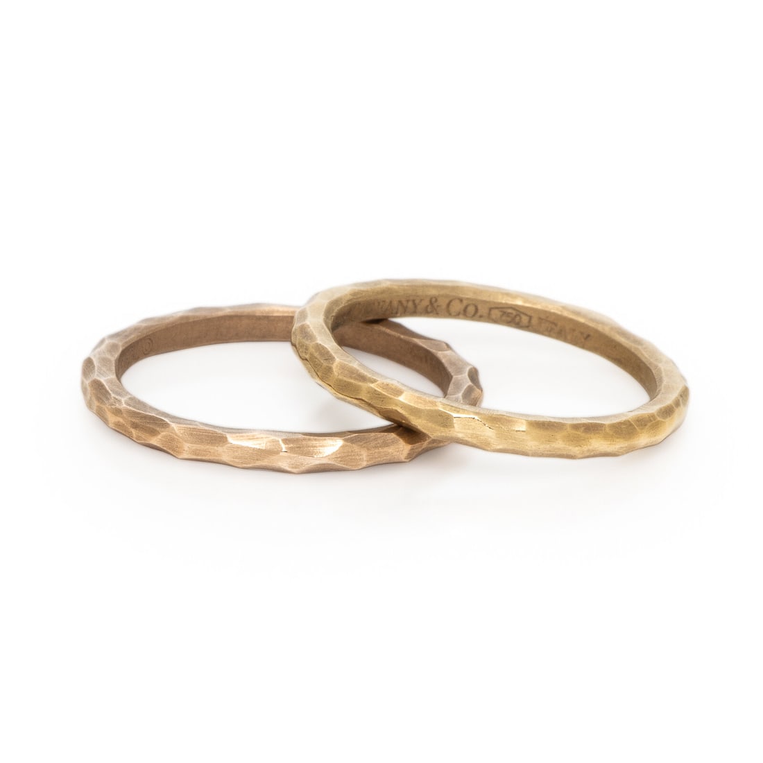Tiffany & Co., Paloma Picasso, Pair of Hammered Gold Rings: Tiffany & Co., Paloma Picasso, Pair of Hammered Gold Rings 18 karat yellow and rose gold. Ring size 4 3/4. Stamp: Paloma Picasso TIFFANY & CO. 750 ITALY. Stamp: Paloma Picasso TIFFANY & CO. 750 ITALY.