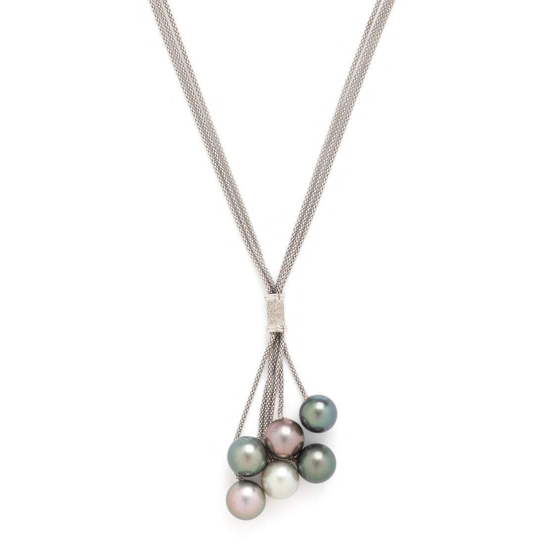 Cultured Pearl and White Gold Tassel Necklace: Cultured Pearl and White Gold Tassel Necklace Variously colored cultured pearls (origin of color not tested) measuring approximately 12.00 - 12.60 mm. 18 karat white gold. 17 inches long, with a 2 7/8