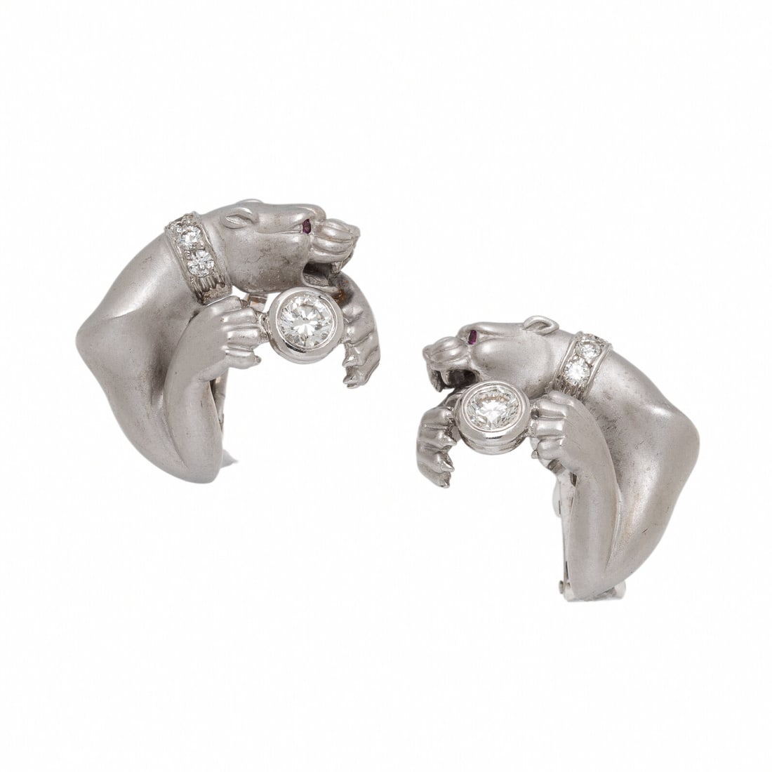 White Gold and Diamond Panther Earrings: White Gold and Diamond Panther Earrings Round brilliant cut diamonds and round rubies. 18 karat white gold. 5/8 inch long. Stamp: (obscured maker's mark) 750 113039. Gross weight: 10.45 dwt. Property 