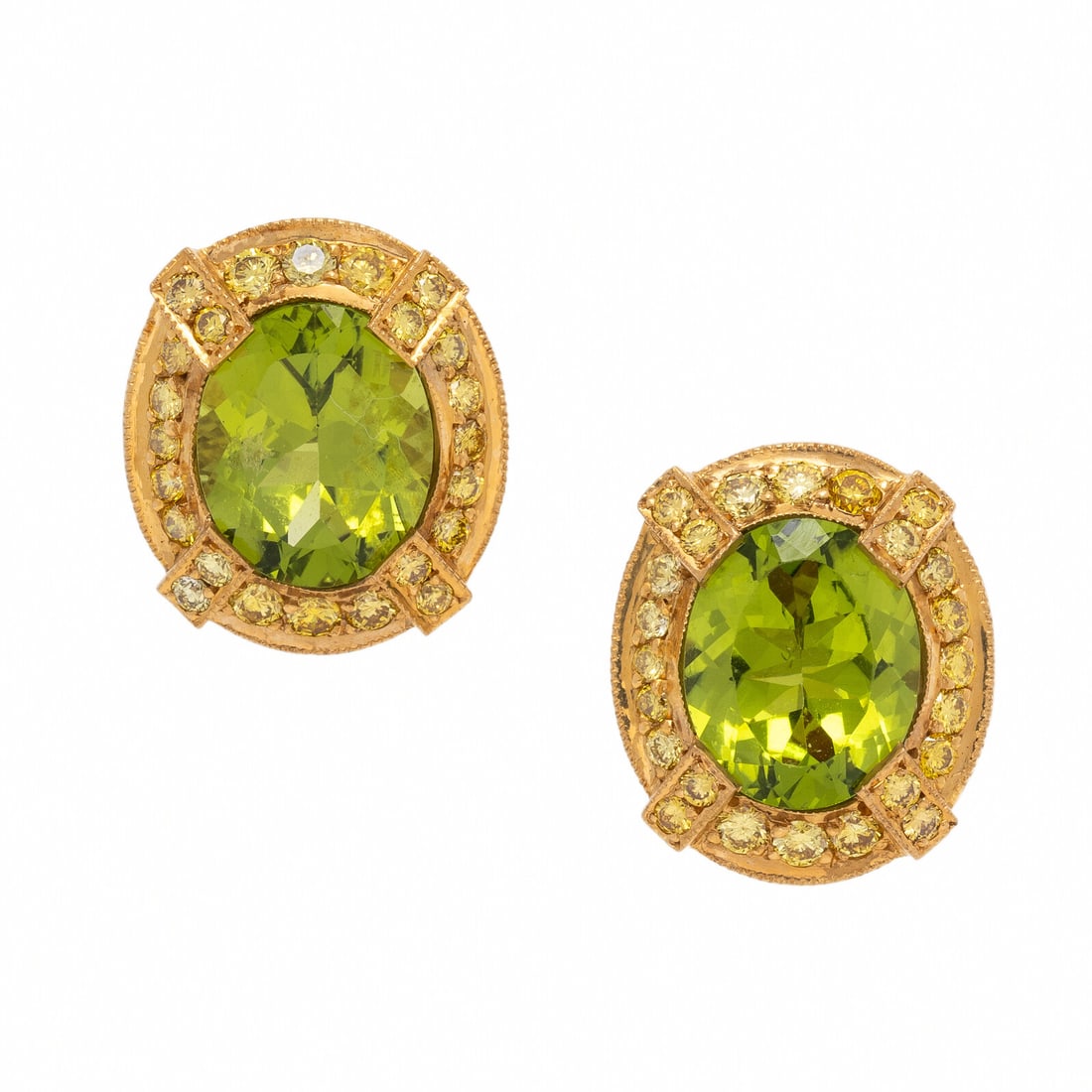 Peridot, Yellow Sapphire, and Yellow Gold Earrings: Peridot, Yellow Sapphire, and Yellow Gold Earrings Oval peridot weighing approximately 3.35 carats each, and round yellow sapphires. 18 karat yellow gold. 11/16 inch long. Stamp: 18K. Gross weight: 7.