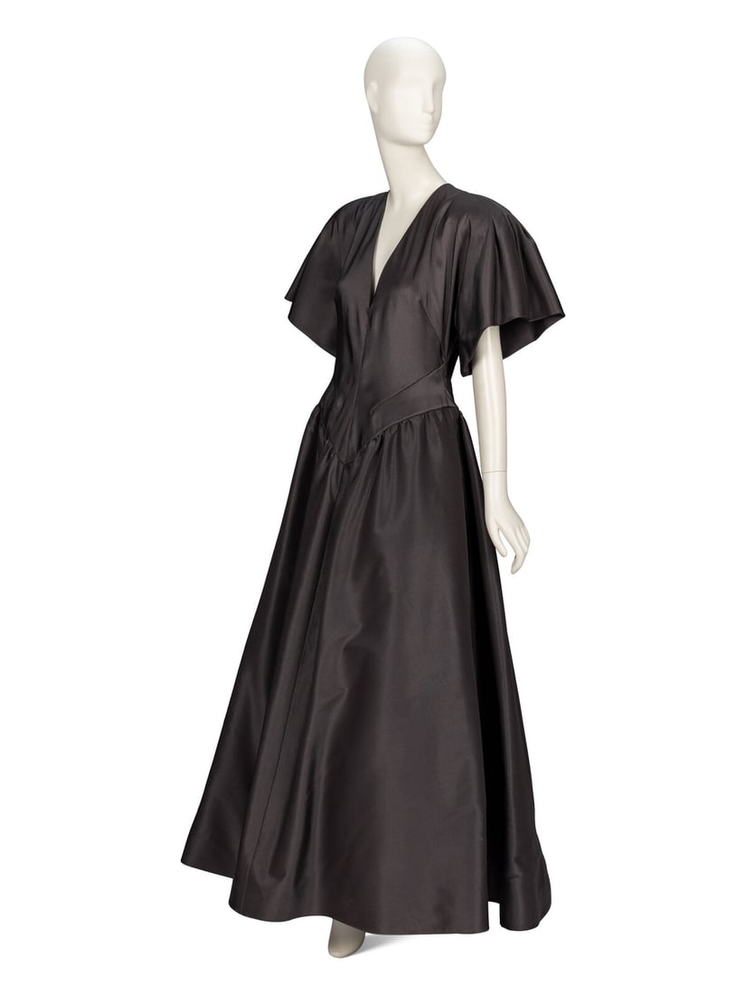 Pauline Trigère, Structural Grey Taffeta Gown: Pauline Trigère, Structural Grey Taffeta Gown Structural evening gown in slate grey silk taffeta. Collarless V neckline. Padding at shoulders. Incorporated flared short sleeves with inverted pleats a