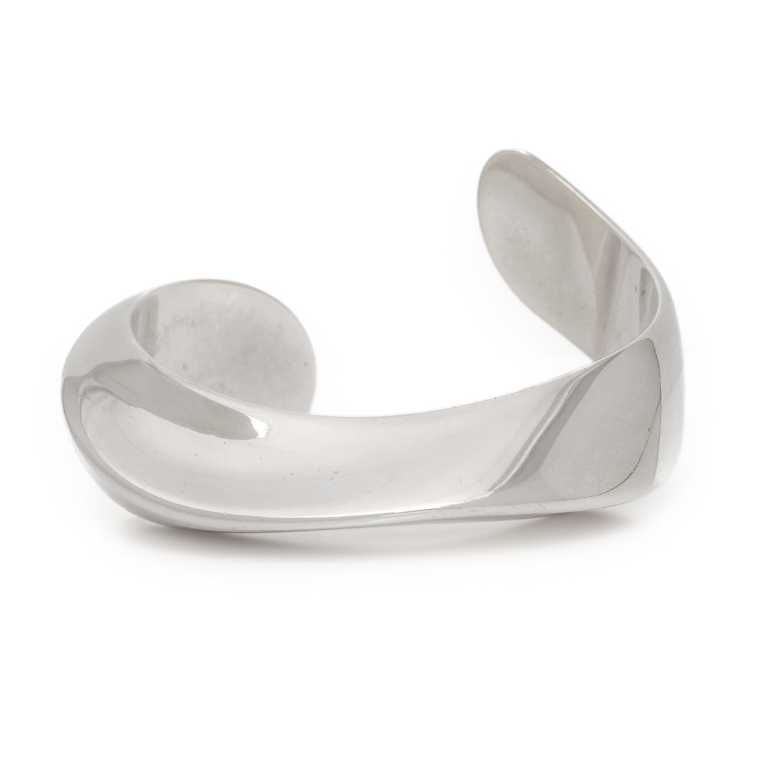 Tiffany & Co., Elsa Peretti, 'Swirl Cuff', Sterling Silver Bracelet: Tiffany & Co., Elsa Peretti, 'Swirl Cuff', Sterling Silver Bracelet Sterling silver. 6 1/8 inches inner circumference. Stamp: TIFFANY & CO. (Elsa Peretti maker's mark) 925 SPAIN. Gross weight: 24.35 d