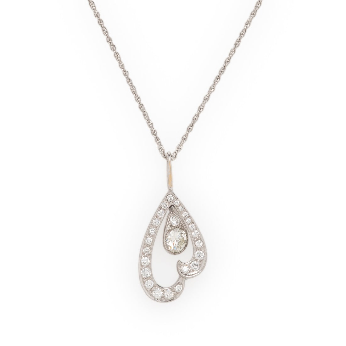 Diamond and White Gold Pendant Necklace: Diamond and White Gold Pendant Necklace Round brilliant cut diamonds weighing approximately 1.20 carat total. White gold and 14 karat white gold. 16 1/8 inches long. Chain stamp: 14K. Gross weight: 2.