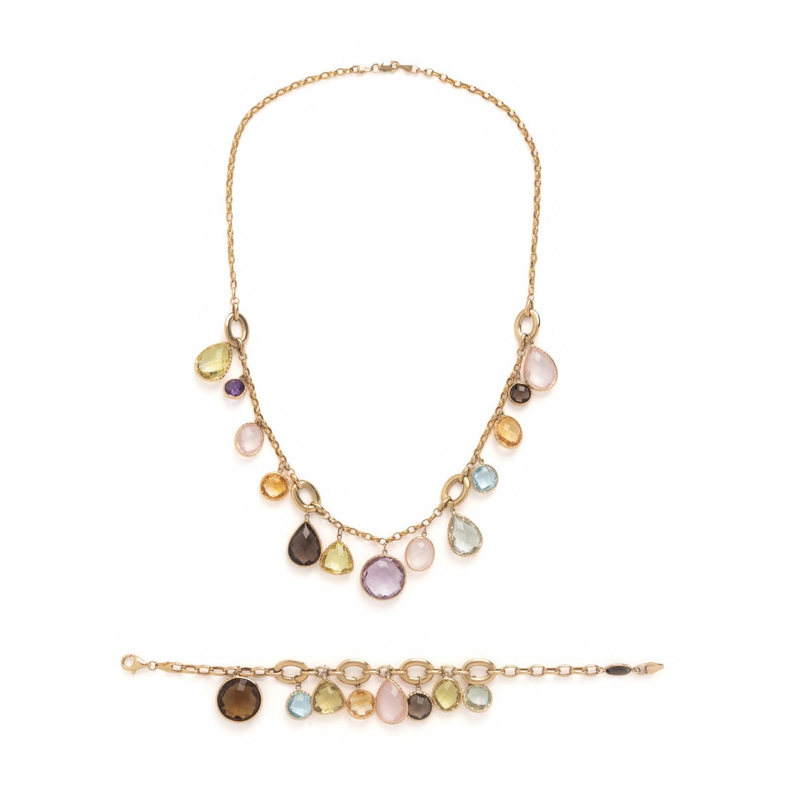 Yellow Gold and Multigem Necklace and Bracelet: Yellow Gold and Multigem Necklace and Bracelet Both set with variously shaped checkerboard faceted gemstones including rose quartz, smoky quartz, citrine, lime quartz, amethyst, and blue topaz. 14 kar