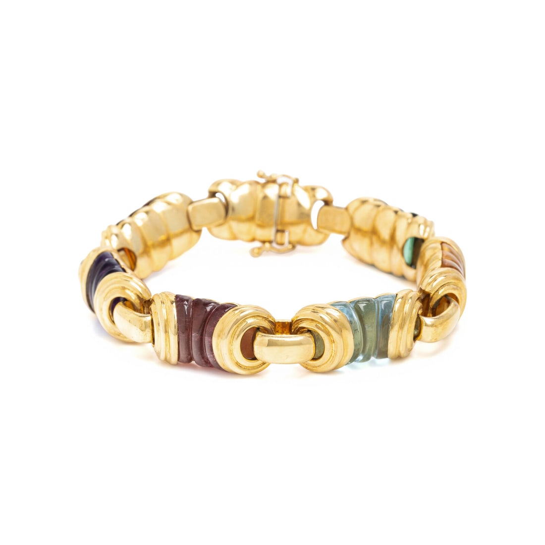 Yellow Gold and Multigem Bracelet: Yellow Gold and Multigem Bracelet Carved green tourmaline, citrine, aquamarine, pink tourmaline, and amethyst. 18 karat yellow gold. 7 1/4 inches long. Stamp: (maker's mark) ITALY 750. Gross weight: 4