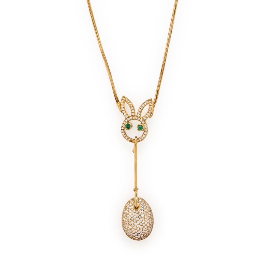 Yellow Gold, Diamond, and Emerald Bunny Necklace: Yellow Gold, Diamond, and Emerald Bunny Necklace Round brilliant cut diamonds weighing approximately 2.50 carats total and round cabochon emeralds. Yellow gold. 18 1/4 inches long, with a drop of 2 3/