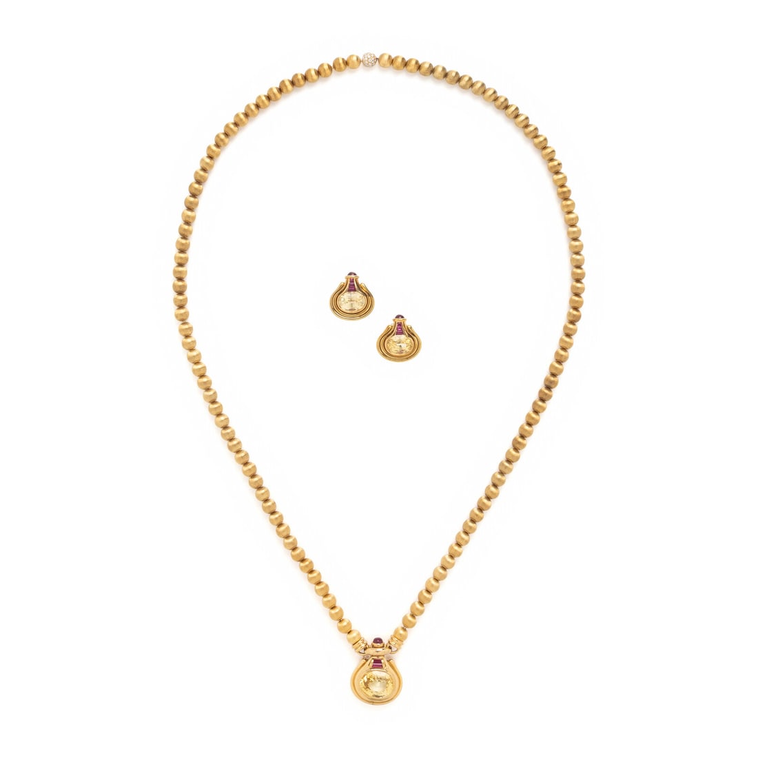 Yellow Sapphire, Synthetic Ruby, and Yellow Gold Demi-Parure: Yellow Sapphire, Synthetic Ruby, and Yellow Gold Demi-Parure Including a pendant necklace and a pair of earrings, the necklace featuring textured gold beads, a bead clasp pavÈ-set with round bril