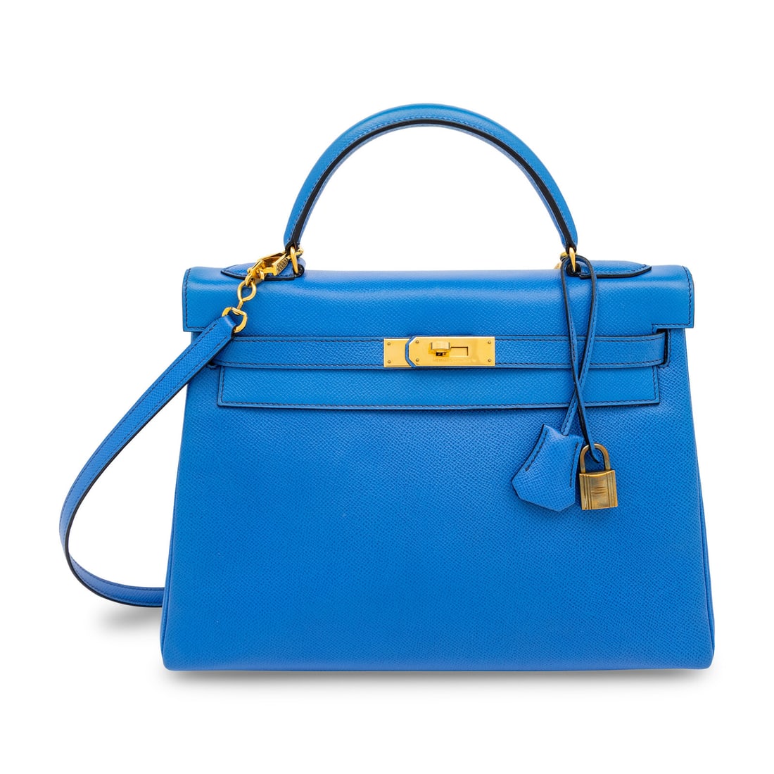Hermès, Kelly 32 in Bleu France Epsom: Hermès, Kelly 32 in Bleu France Epsom Kelly 32 bag in Bleu France Epsom leather with gold-plated hardware. Label: Hermès Stamp: T in Circle Date: 1990 Country of Origin: France Approximate Measureme