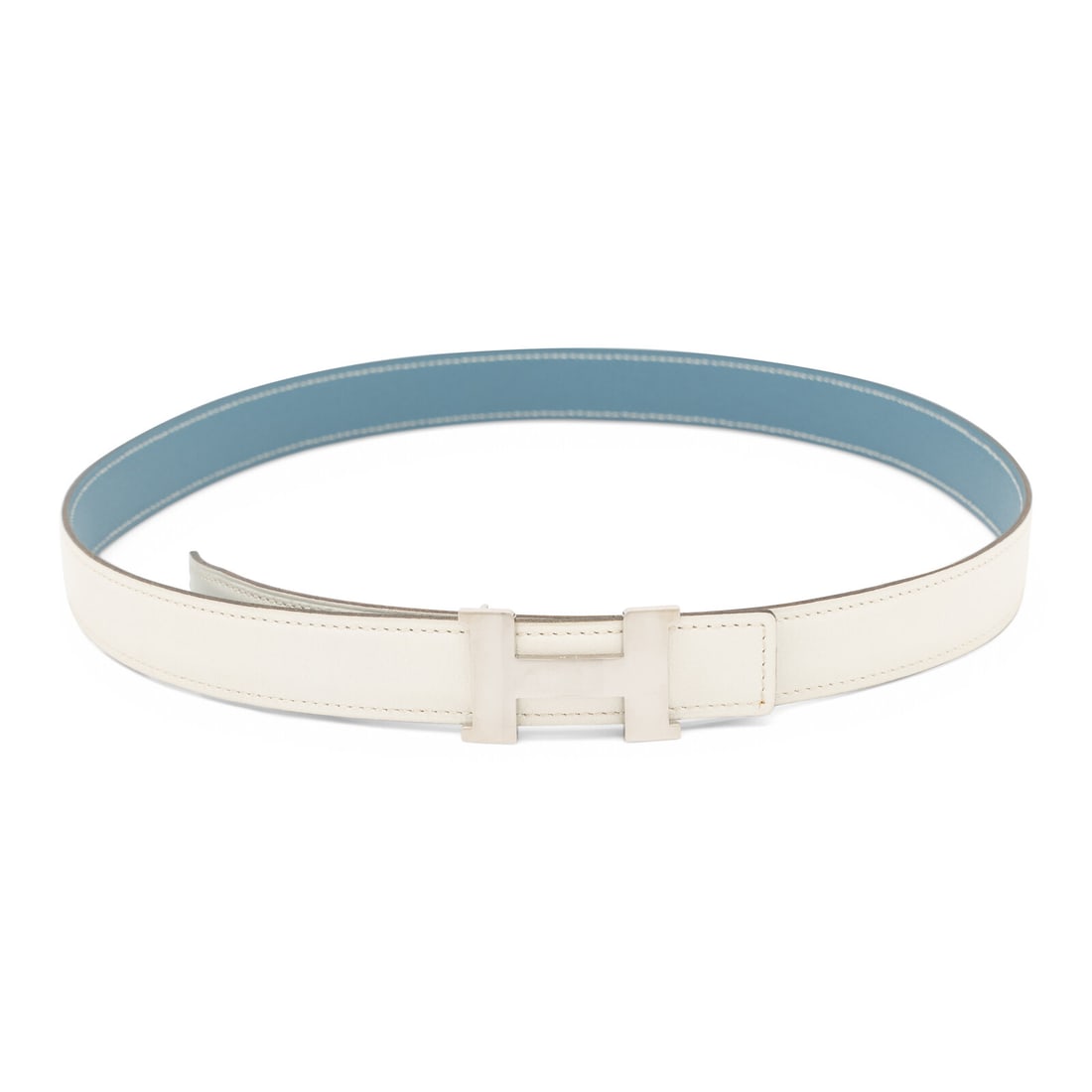 Hermès, White/Blue Constance Belt: Hermès, White/Blue Constance Belt Constance belt in white Swift leather with a light blue Epsom leather reverse. Palladium-plated H belt buckle. Label: Hermès Size Label: 80 Stamp: K in Square Date: