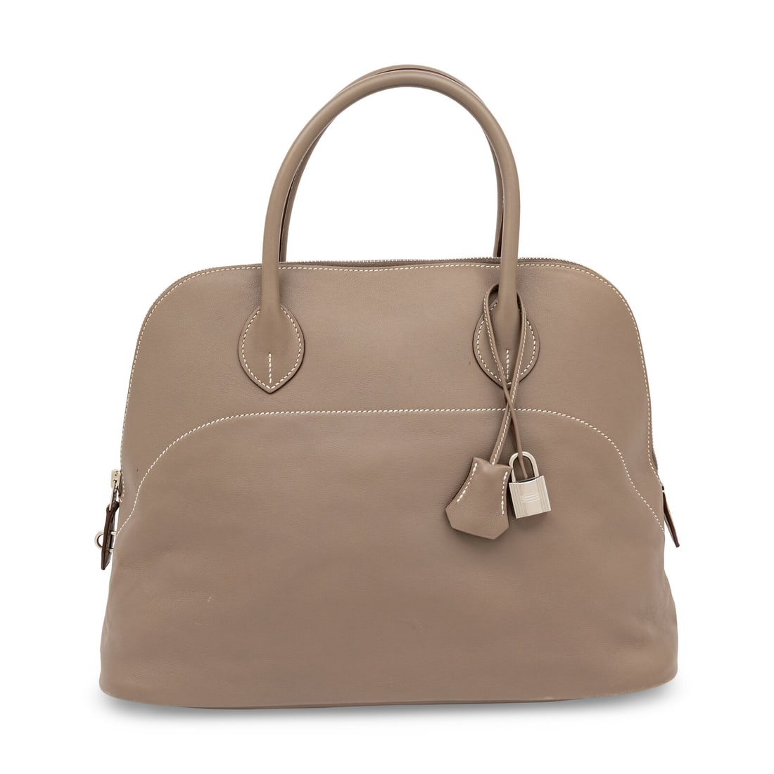 Hermès, Bolide 35 in …tain Swift Leather: Hermès, Bolide 35 in …tain Swift Leather Bolide Mou 35 handbag in …tain mink grey Swift leather with palladium-plated hardware. Zipper closure and rolled leather handles. Label: Hermès Style/Ser